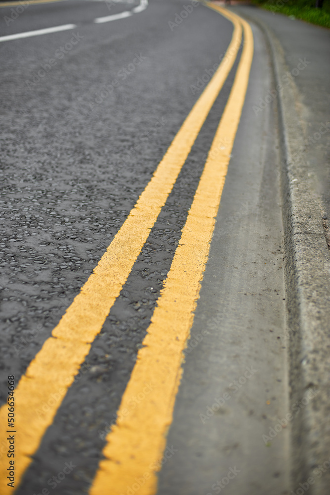 Double solid line of road markings in yellow. Perfectly clean border. Yellow road markings Stock