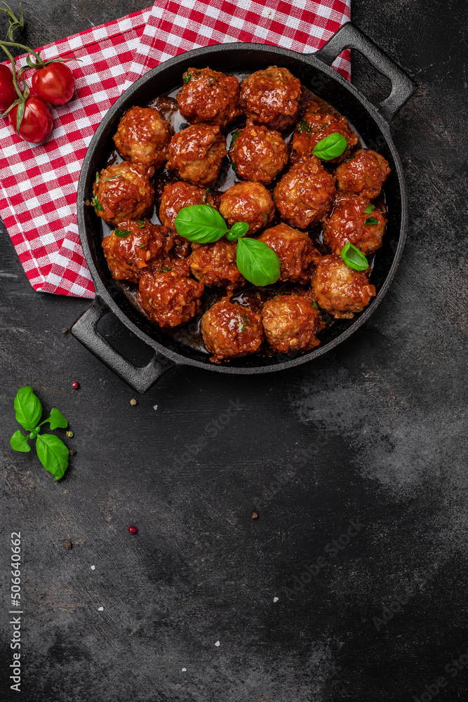 meatballs. Traditional spicy meatballs in sweet and sour tomato sauce. Restaurant menu, dieting, cookbook recipe vertical image. top view. place for text