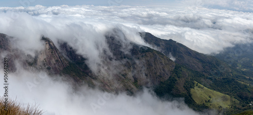 Sea of clouds over mountains  forming a wave over the summits  sea of fog  mountain with fog  Teres  polis  Rio de Janeiro  Brazil