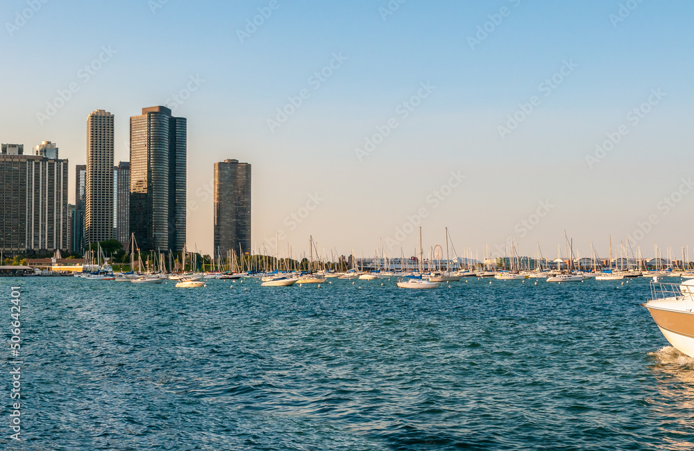 Landscape of lake Michigan with boats, yachts and skyscrapers in background, Chicago, Illinois, USA