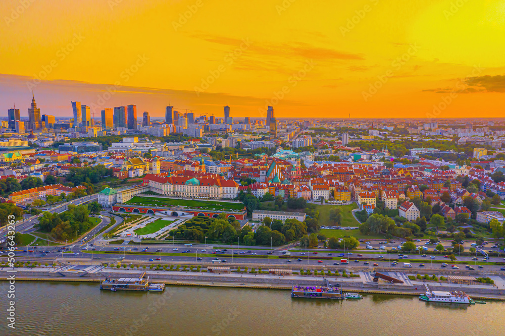 Fototapeta premium Panorama of Old Town and downtown of Warsaw from drone perspective during sunset