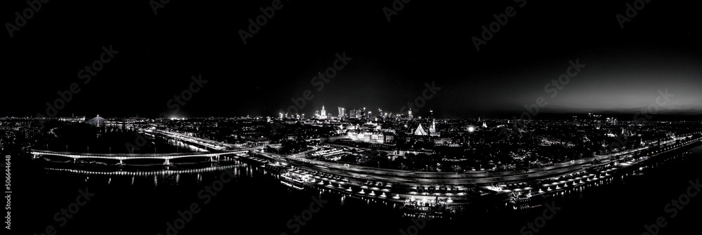 Black and white Aerial view of old buildings, castles and a church in the old city of Warsaw. Cityscape of old buildings and architecture in the old town in Warsaw. Night time Black and white Aerial view of old buildings, castles and a church in the old city of Warsaw. Cityscape of old buildings and architecture in the old town in Warsaw. Night time