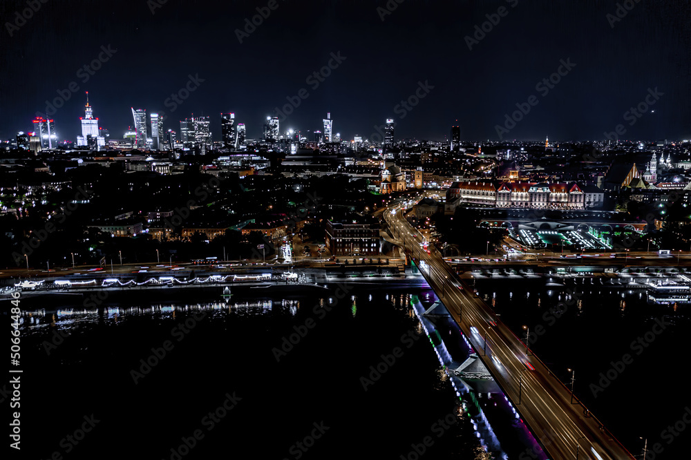 Warsaw, Poland  Cityscape with high angle above aerial view of historic architecture buildings in old town market square at night