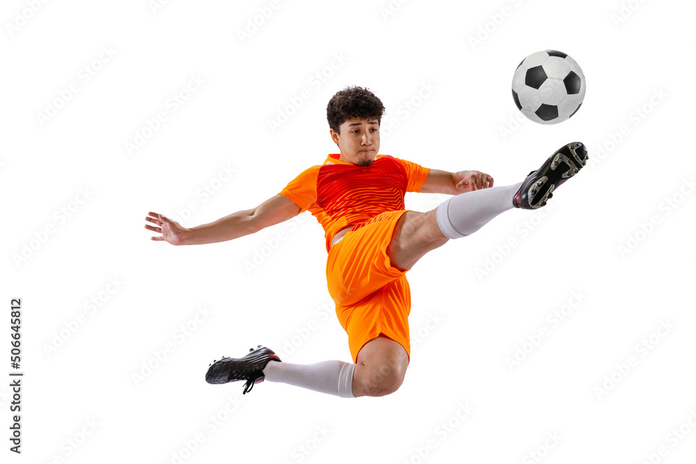 Fototapeta premium Professional football, soccer player in motion isolated on white studio background. Concept of sport, match, active lifestyle, goal and hobby