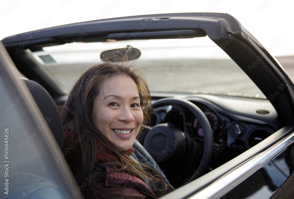 Portrait happy woman in convertible Portrait happy woman in convertible