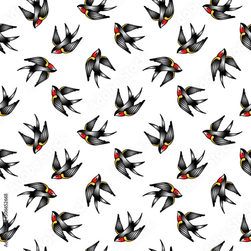 seamless background with swallows in the style of an old-school tattoo. 