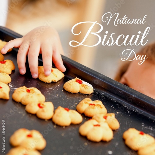 Composite of national biscuit day text with caucasian girl keeping biscuit in tray