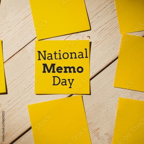 Composite image of national memo day text with yellow adhesive notes on wooden table, copy space