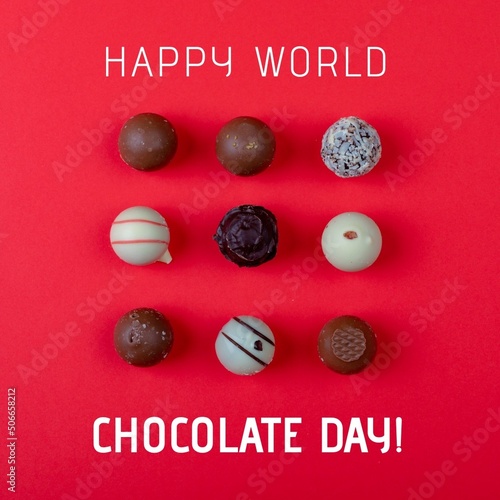 Composite image of happy world chocolate day text with chocolate balls on red background, copy space