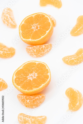 Tangerine or kamala over on white background,top view