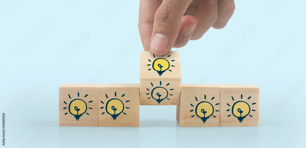 Wooden cubes in hand with copy space for input wording Wooden cubes in hand with copy space for input wording