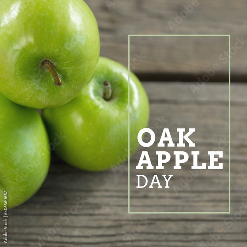 Digital composite image of juicy granny smith apples on table with oak apple day text