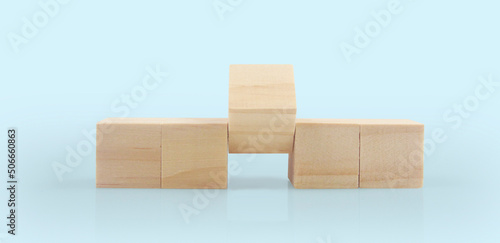 wood cube arrange in shape business concept