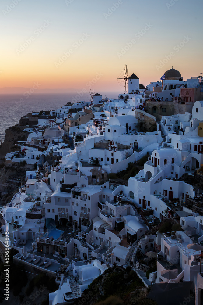 Twilight over Santorini famous view. Vacation in Greece.