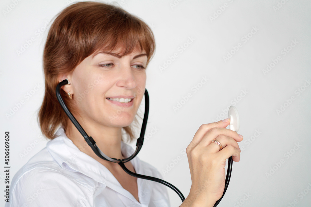 woman doctor take stethoscope on the white background