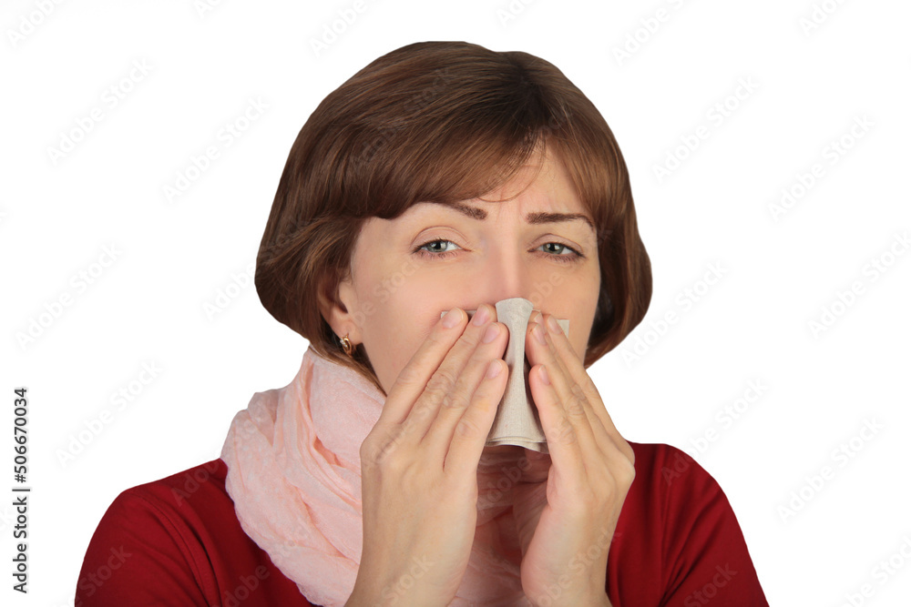 Portrait of sick woman in scarf sneezing in napkin, cleaning running nose and coughing, suffering influenza Portrait of sick woman in scarf sneezing in napkin, cleaning running nose and coughing, suffering influenza