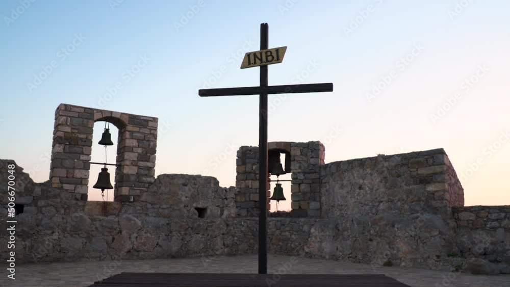 A cross placed in the center of an outdoor courtyard at a Greek Orthodox church in Leros, Greece. A cross placed in the center of an outdoor courtyard at a Greek Orthodox church in Leros, Greece.