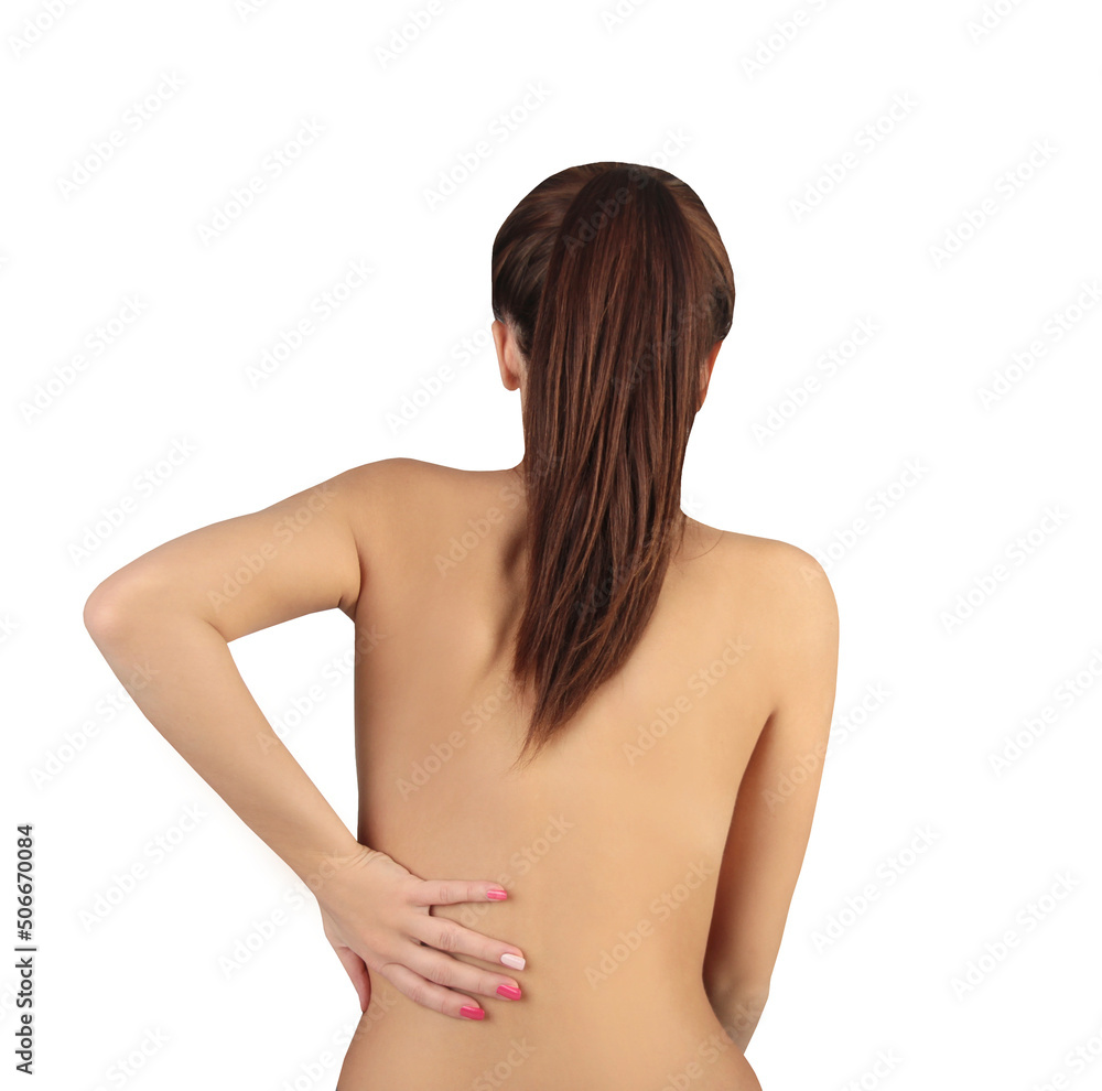 Brunette woman showing pain in her back against a white background Brunette woman showing pain in her back against a white background