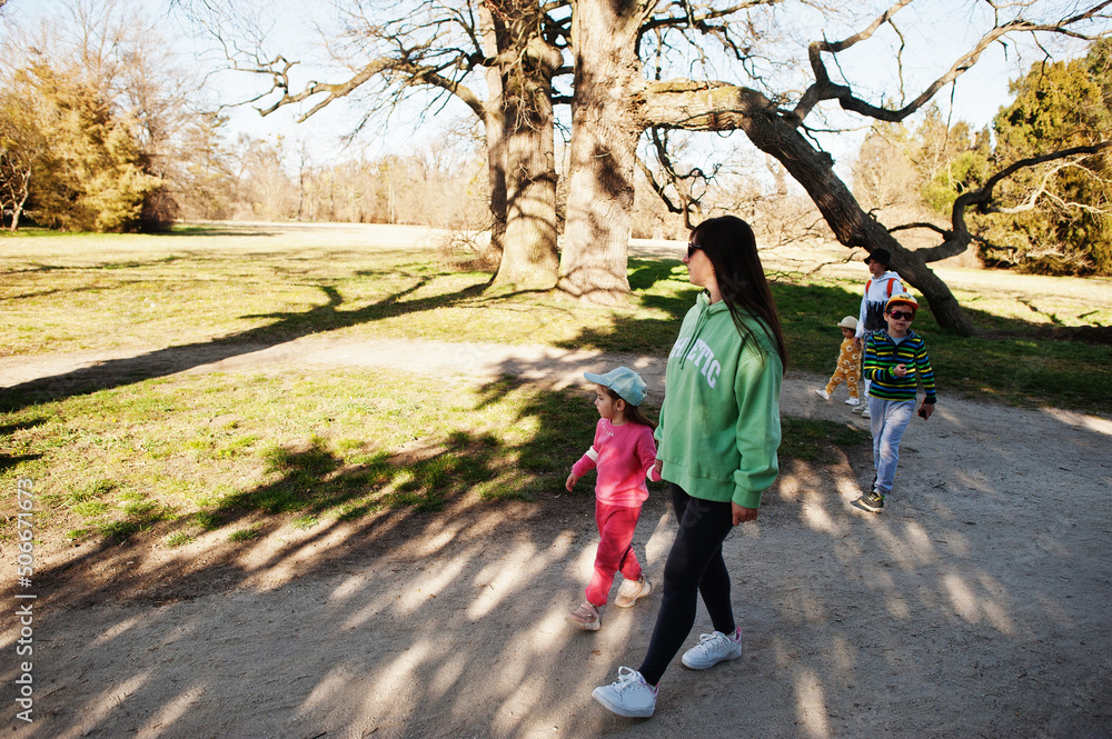 Mother with four kids at Lednice park, Czech Republic. Mother with four kids at Lednice park, Czech Republic.