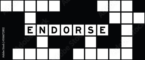 Alphabet letter in word endorse on crossword puzzle background