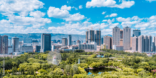 Photography Ferris wheel and city skyline scenery in Qingcheng Park, Hohhot, Inner Mongolia,