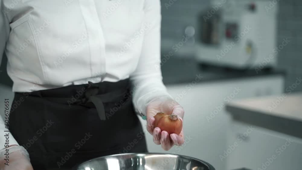 girl cleans onions with a hand girl cleans onions with a hand