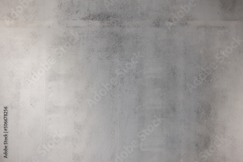 The gray texture of concrete with streaks