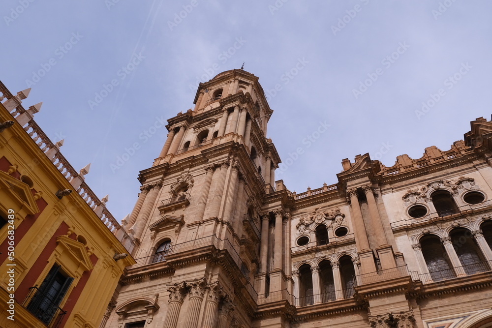 Symmetrical fragment of architecture of the Cathedral Tower. The Cathedral of Malaga is a national landmark. Old Town of Malaga, Andalusia, southern Spain, Europa.