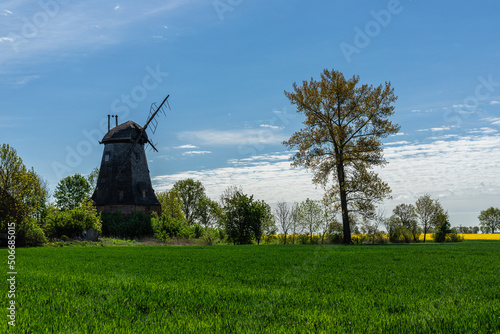 The old windmill in Palczewo in the spring sun