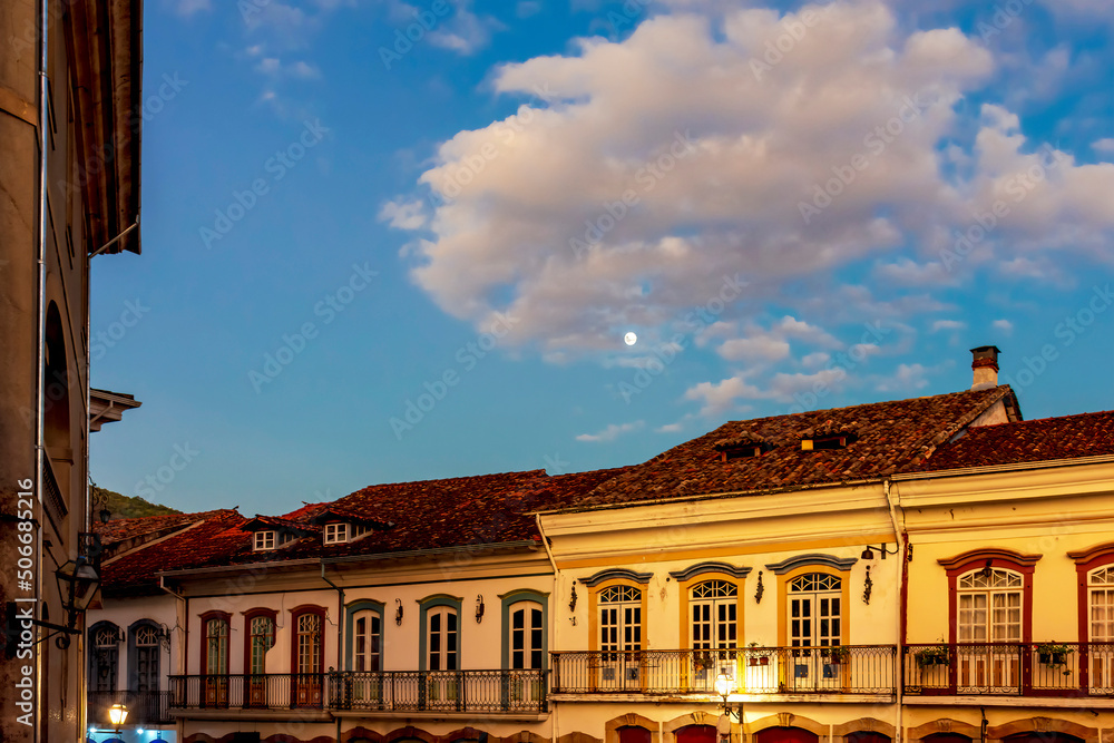 Fototapeta premium Facades of old colonial style houses with their balconies and windows in the historic city of Ouro Preto in Minas Gerais, Brazil