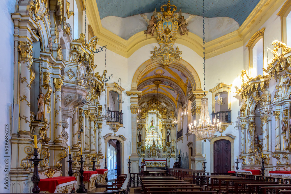 Interior of richly decorated historic Brazilian baroque church in Ouro Preto city in Minas Gerais, Brazil