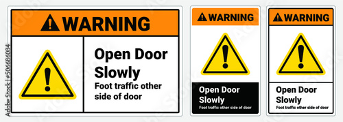 фотографія Safety sign Open door slowly, foot traffic other side of door caution