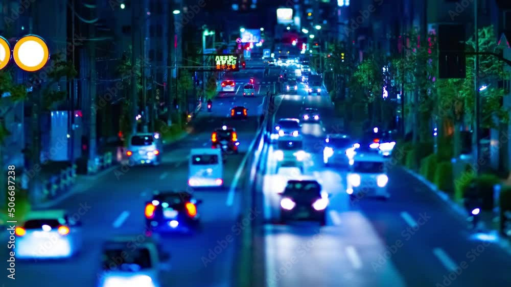A night timelapse of the miniature traffic jam at the downtown street in Tokyo tilt A night timelapse of the miniature traffic jam at the downtown street in Tokyo tilt