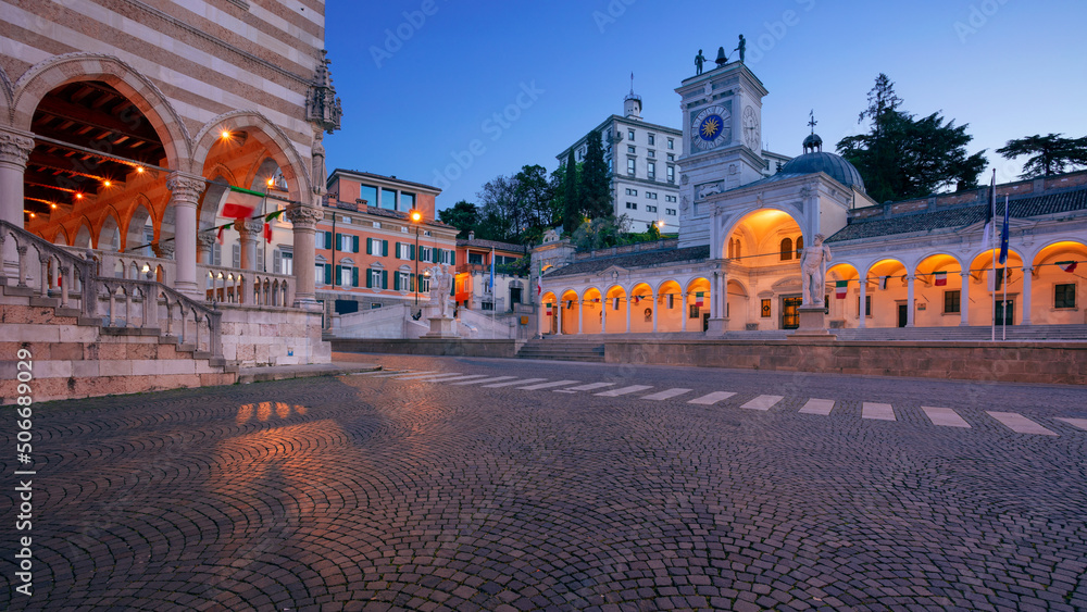 Udine, Italy. Cityscape image of downtown Udine, Italy with town square at sunrise.