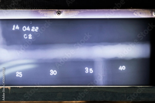 Fotografija View of linear crack in weld metal with radiograph film