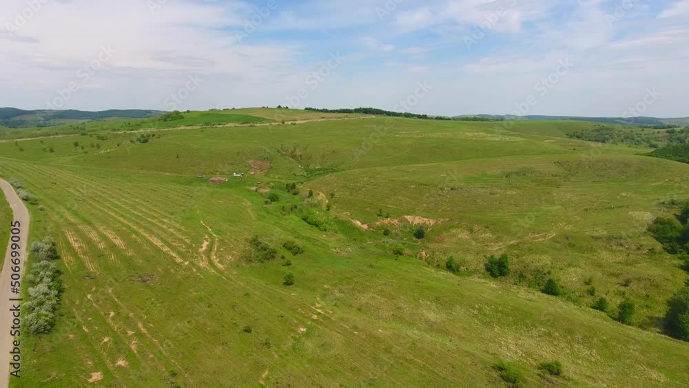 Aerial view of harvest fields and forest, Spring time, beautiful landscape of Romania Aerial view of harvest fields and forest, Spring time, beautiful landscape of Romania