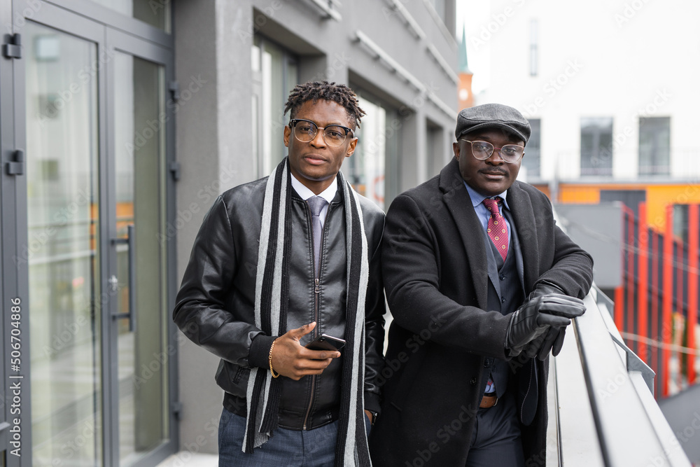portrait of two african friends in stylish clothes portrait of two african friends in stylish clothes