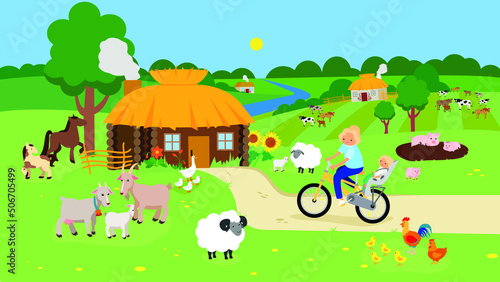 A woman carries a child on a bicycle among the animals in the village