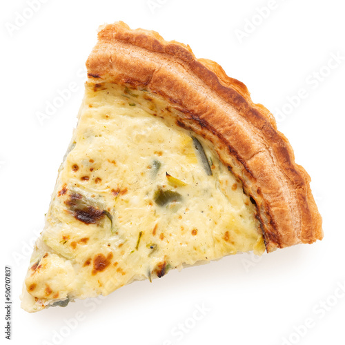 Slice of leek and emmental quiche isolated on white from above.