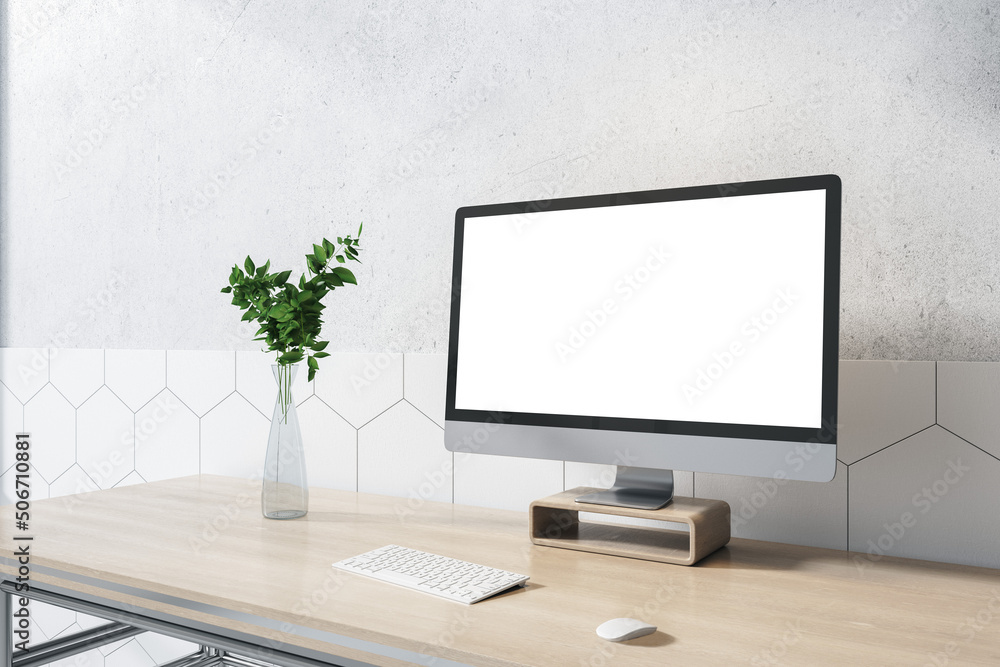 Fototapeta premium Side view on blank white monitor with copyspace for your text on wooden table with glass vase and keyboard, home office concept. 3D rendering, mock up