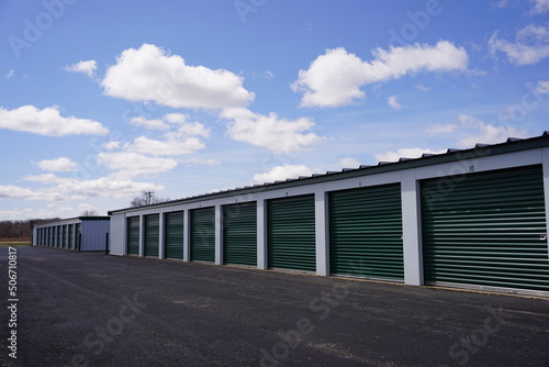 Green and tan storage units service the community to hold the owner's property.