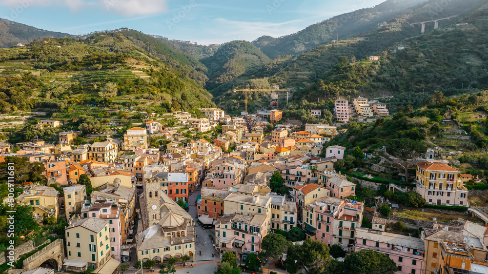Aerial view of Monterosso and landscape of Cinque Terre,Italy.UNESCO Heritage Site.Picturesque colorful coastal village located on hills.Summer holiday,travel background.Italian Riviera.