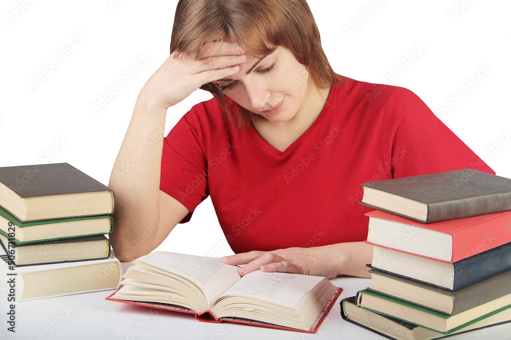 portrait of beautiful student girl sitting among the books portrait of beautiful student girl sitting among the books