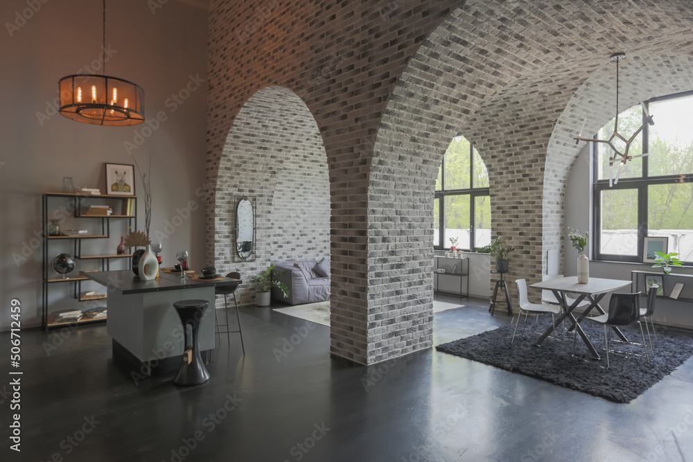 modern luxury design of a brutal apartment interior with arches in the style of a medieval castle with bright accents. free layout, kitchen area, seating and eating area.