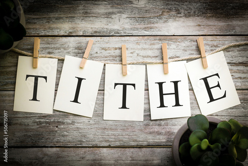 Fotografija The Word TITHE Concept Printed on Cards