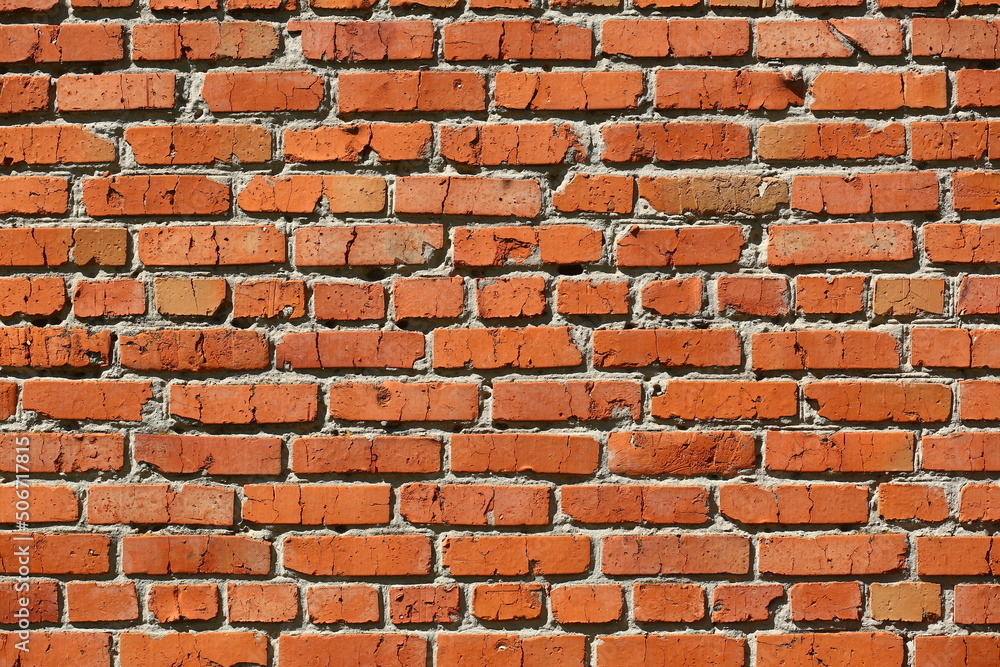 Obraz premium Old weathered orange brick abstract background