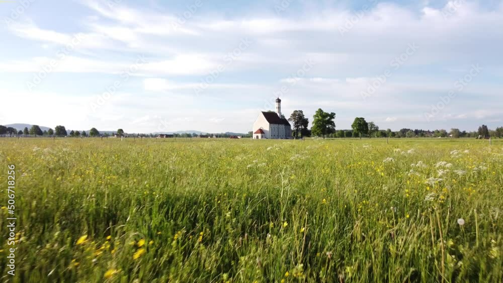 Europe Church in a field, fast low flying dolly shot Europe Church in a field, fast low flying dolly shot