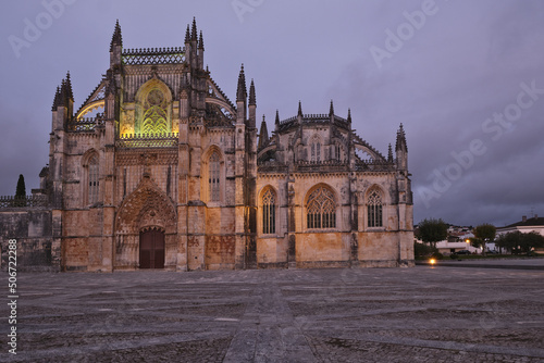 the Facade of the Main Entrance at the Batalha Monastery at night  Portugal