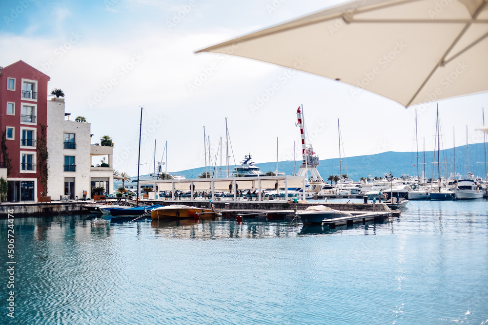 Fototapeta premium Montenegro. Tivat. Gorgeous beautiful places near the sea, palm trees, boats, restaurants and rest by the water.