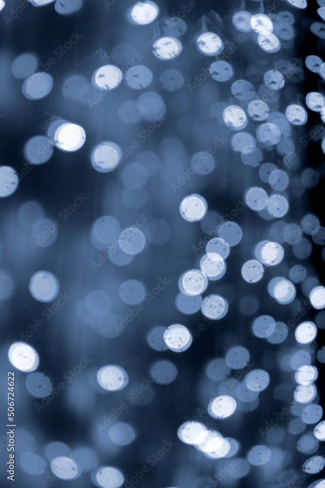 White Bokeh Lights on Dark Blue City Background White Bokeh Lights on Dark Blue City Background